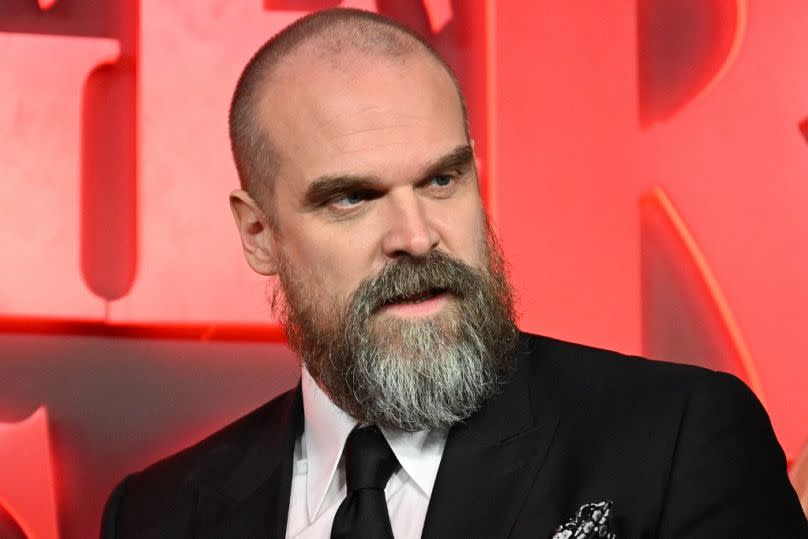 US actor David Harbour poses on the red carpet upon arrival to attend the West End world premiere of "Stranger Things: The Last Shadow"