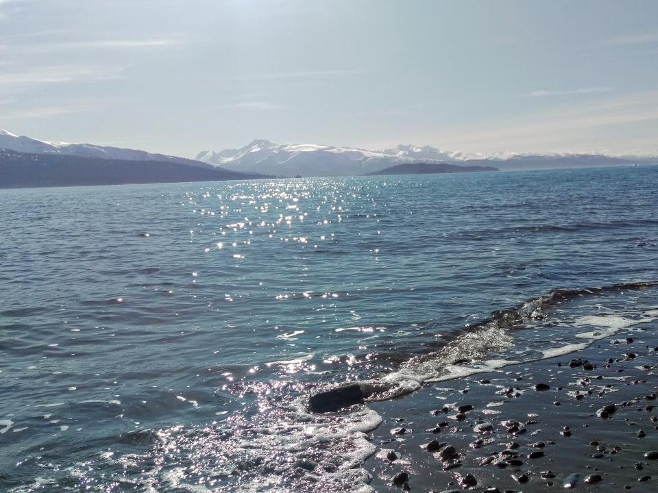 A view of Kachemak Bay with mountains in the background