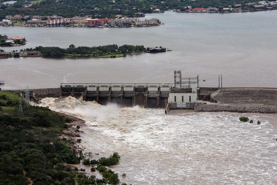 Wirtz Dam, which forms Lake LBJ, is seen on June 27, 2007, releasing excess water from flash flooding. On Wednesday, two floodgates were open at Wirtz Dam after recent rains.