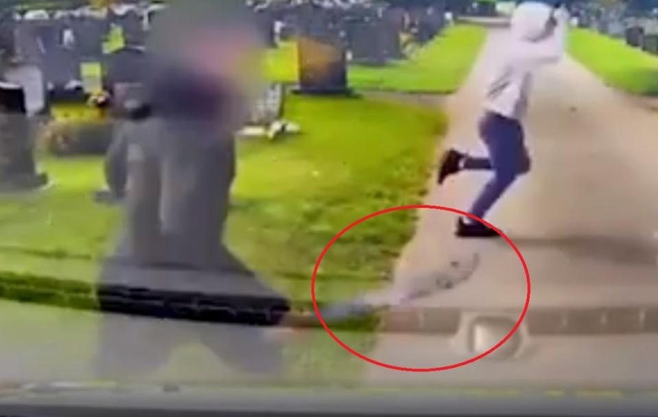 Man carries machete amid cemetry brawl (South Wales Police)