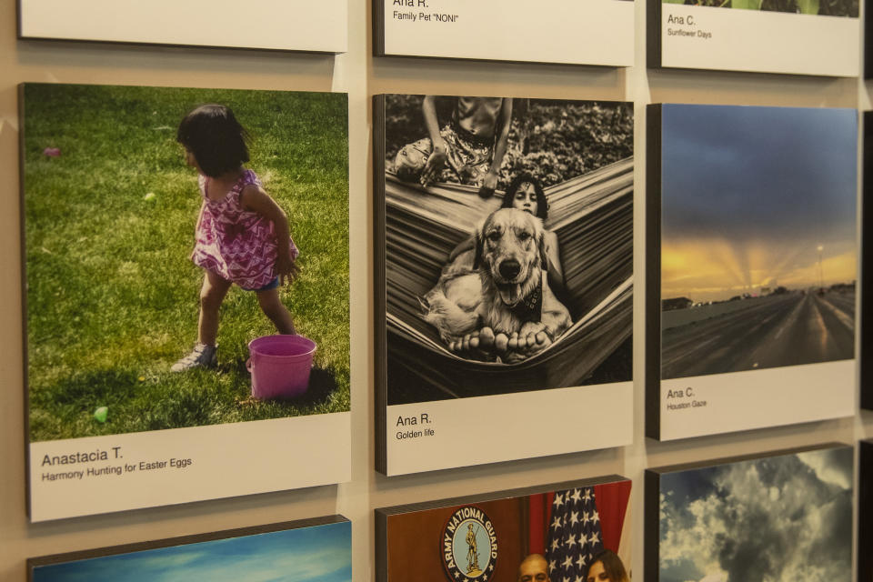 A photo of the family dog with kids in monochrome stands out on a colorful wall. (Photo: Gordon Donovan/Yahoo News)