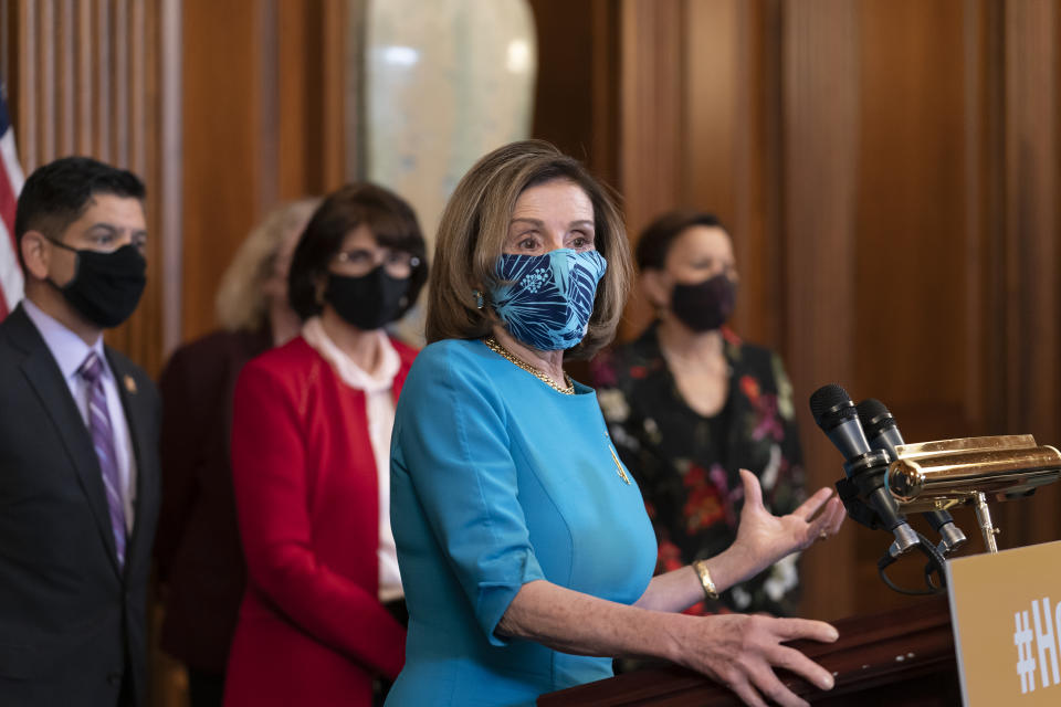 Speaker of the House Nancy Pelosi, D-Calif., joined from left by Raul Ruiz, D-Calif., chairman of the House Hispanic Caucus, Rep. Lucille Roybal-Allard, and Rep. Nydia Velazquez, D-N.Y., discusses the upcoming vote on the American Dream and Promise Act of 2021, a bill to help reform the immigration system, at the Capitol in Washington, Thursday, March 18, 2021. (AP Photo/J. Scott Applewhite)