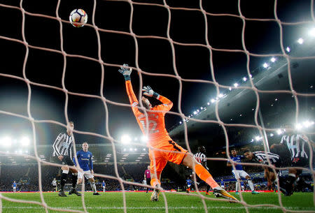 Soccer Football - Premier League - Everton v Newcastle United - Goodison Park, Liverpool, Britain - April 23, 2018 Everton's Theo Walcott scores their first goal REUTERS/Andrew Yates