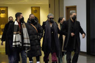 Family members of actor Jussie Smollett depart the Leighton Criminal Courthouse Monday, Nov. 29, 2021, during jury selection in Smollett's trial in Chicago. Smollett is accused of lying to police when he reported he was the victim of a racist, anti-gay attack in downtown Chicago nearly three years ago.(AP Photo/Charles Rex Arbogast)