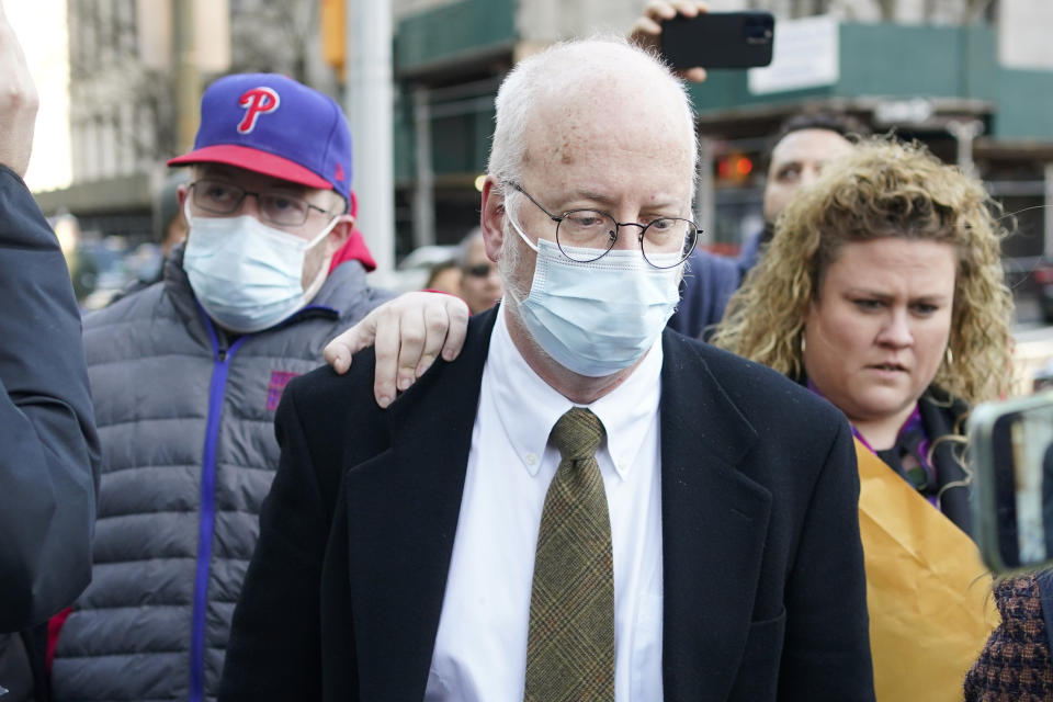 Robert Hadden, center, leaves the federal courthouse in New York, Tuesday, Jan. 24, 2023. Hadden, a gynecologist who molested patients during a decades long career, was convicted of federal sex trafficking charges Tuesday, after nine former patients told a New York jury how the doctor they once trusted attacked them sexually when they were most vulnerable. (AP Photo/Seth Wenig)