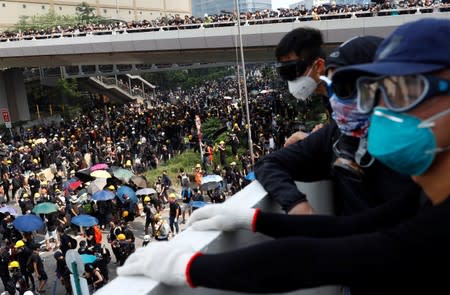 Demonstrators attend a protest in Hong Kong