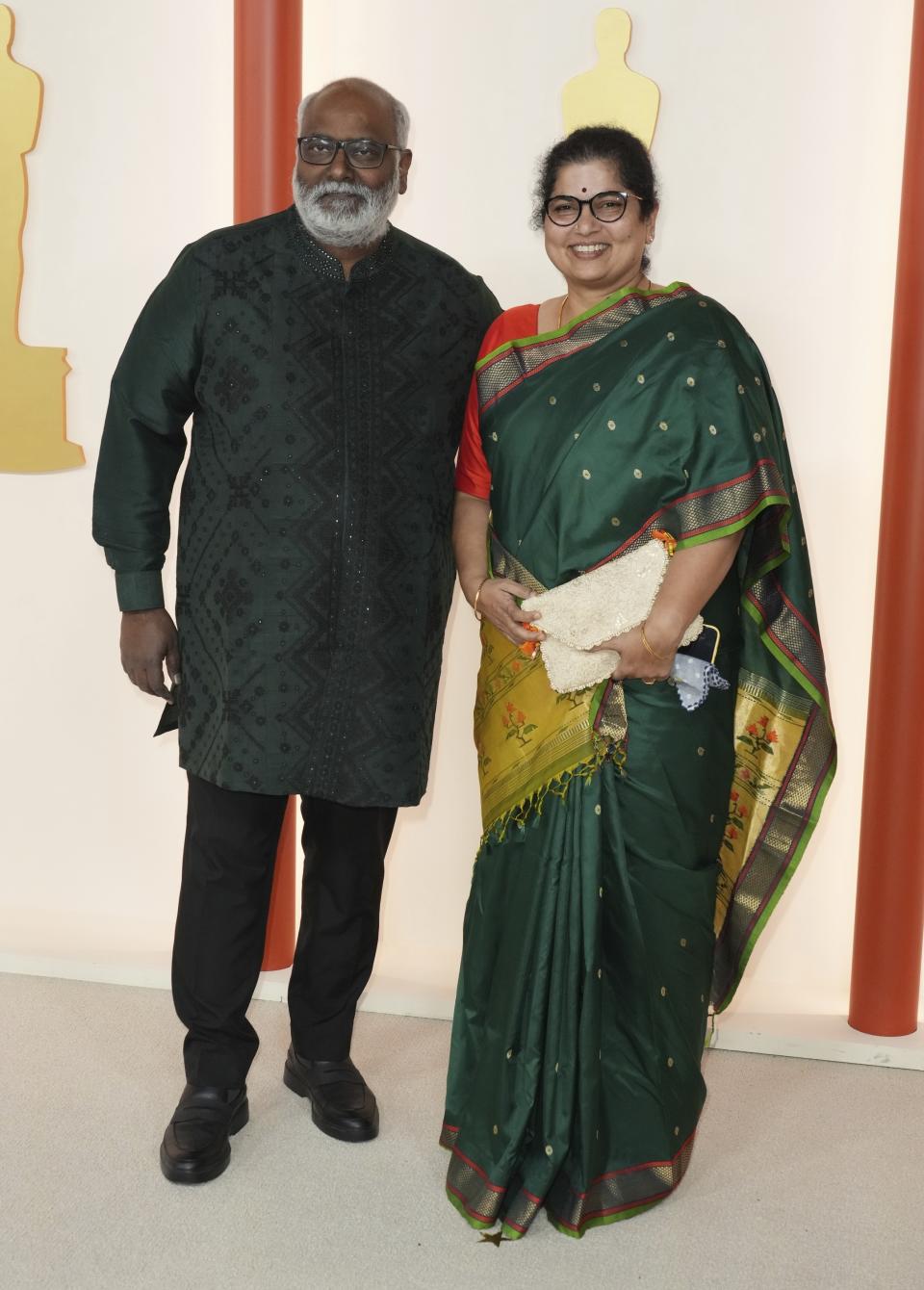 M.M. Keeravaani, left, and M. M. Srivalli arrive at the Oscars on Sunday, March 12, 2023, at the Dolby Theatre in Los Angeles. (Photo by Jordan Strauss/Invision/AP)