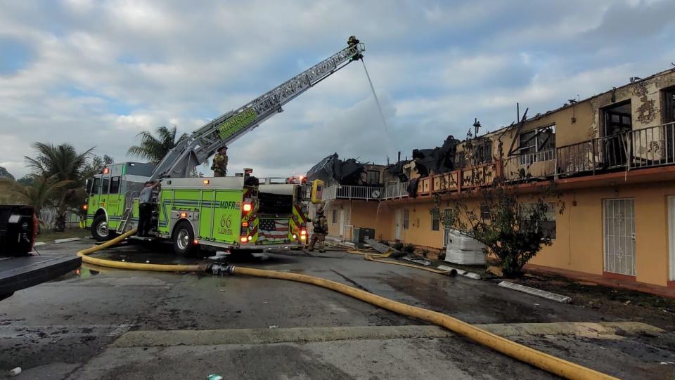 Miami Dade fire rescue units work to stabilize an apartment building after a three-alarm fire. / Credit: Miami-Dade Fire Rescue
