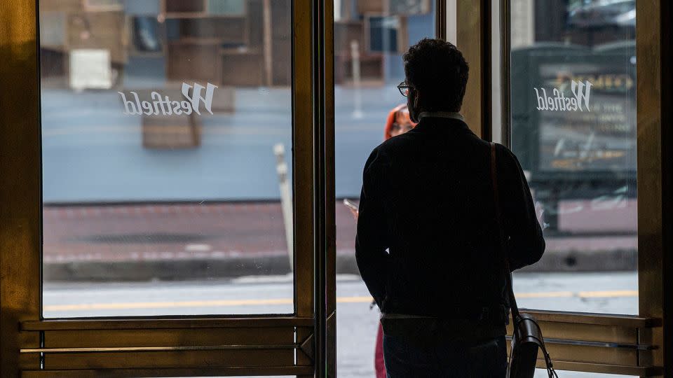 A shopper exits the Westfield San Francisco Centre shopping mall in San Francisco, California, US, on Tuesday, June 13, 2023. The owners of the mall are giving up the property to lenders, adding to deepening real estate pain in a city struggling to bring back workers and tourists after the pandemic.  - David Paul Morris/Bloomberg/Getty Images