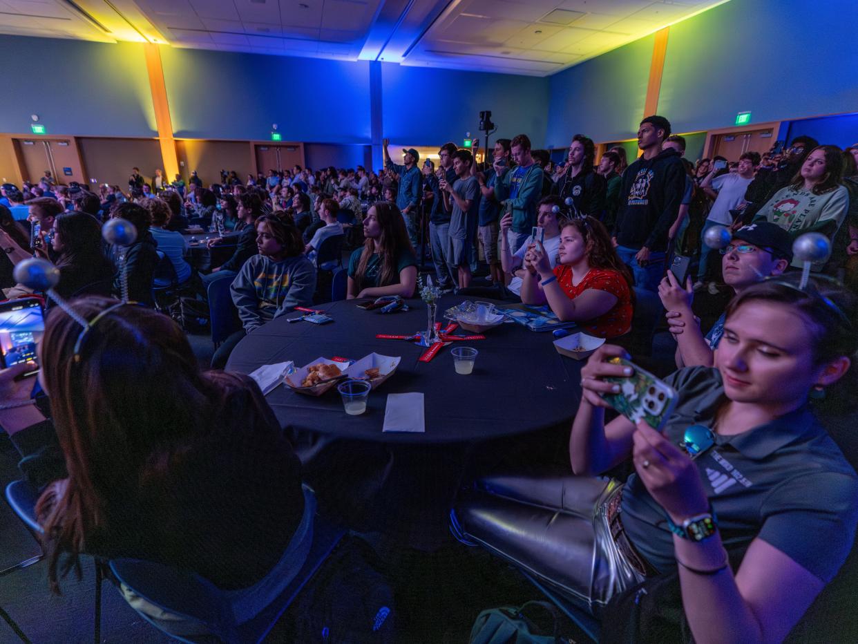 Embry-Riddle Aeronautical University students celebrate the Thursday Moon landing of Intuitive Machines' Odysseus, which carried aboard a camera built by their fellow students.