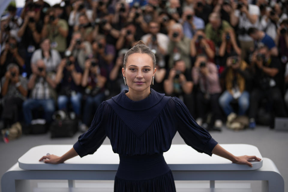 Alicia Vikander poses for photographers at the photo call for the film 'Firebrand' at the 76th international film festival, Cannes, southern France, Monday, May 22, 2023. (AP Photo/Daniel Cole)