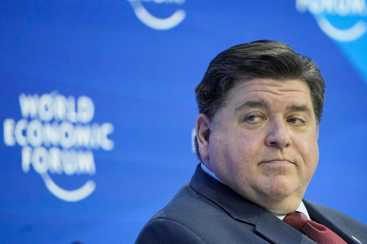 Illinois Gov. JB Pritzker attends a panel at the World Economic Forum in Davos, Switzerland Tuesday, Jan. 17, 2023. The annual meeting of the World Economic Forum is taking place in Davos from Jan. 16 until Jan. 20, 2023. (AP Photo/Markus Schreiber)