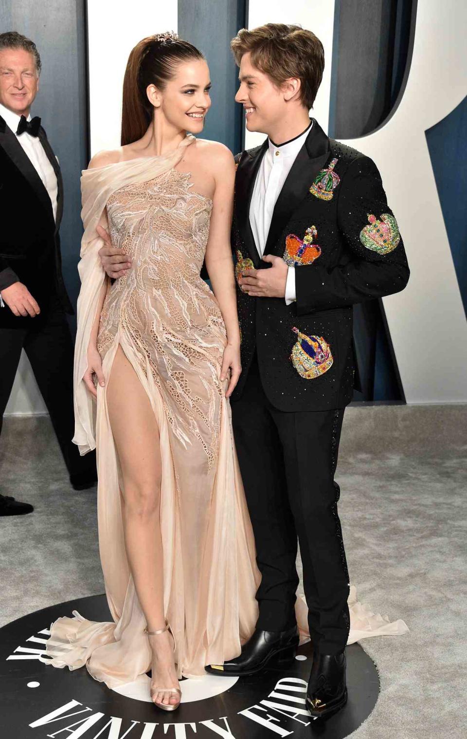 Barbara Palvin and Dylan Sprouse attend the 2020 Vanity Fair Oscar Party hosted by Radhika Jones at Wallis Annenberg Center for the Performing Arts on February 09, 2020 in Beverly Hills, California