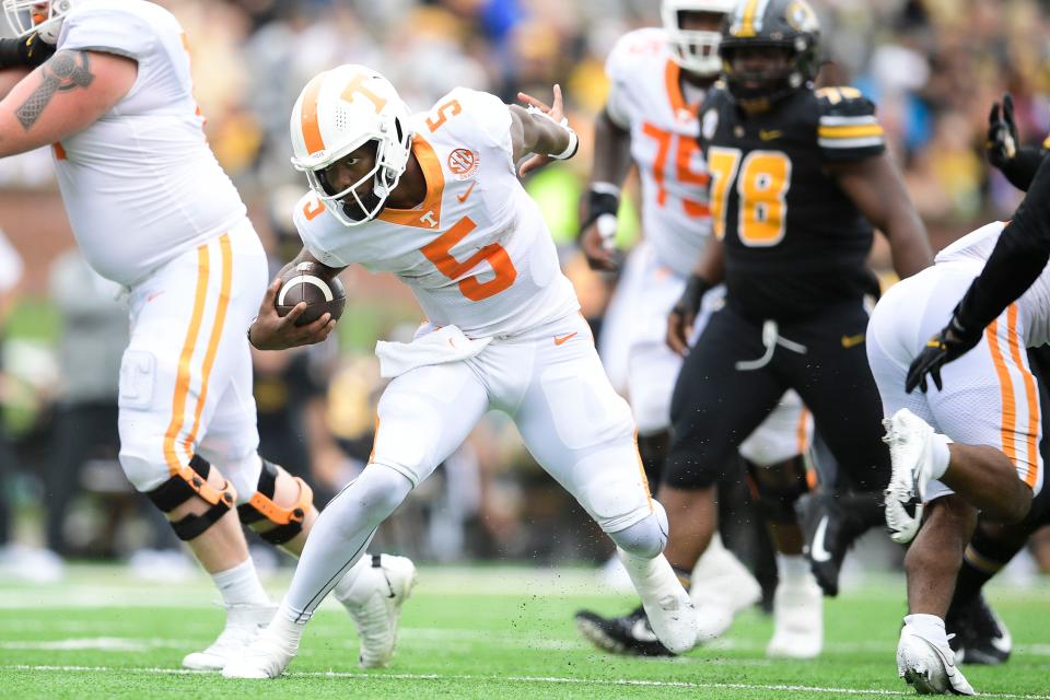 Tennessee quarterback Hendon Hooker (5) runs the ball during a game Tennessee and Missouri at Faurot Field in Columbia, Mo. on Saturday, Oct. 2, 2021.