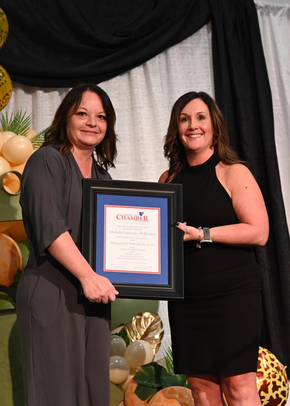 Michelle Carpenter-Wilkinson received the Distinguished Public Service Award from Jennifer Vincent.
