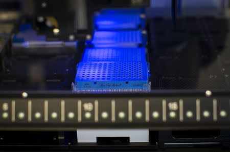 A robotic DNA sample automation machine works on DNA samples at a Regeneron Pharmaceuticals Inc. laboratory at the biotechnology company's headquarters in Tarrytown, New York March 24, 2015. REUTERS/Mike Segar