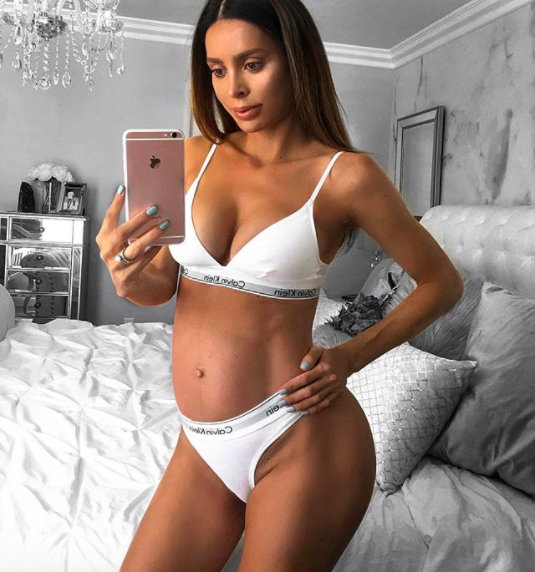 Fitness blogger Sarah shared this image of herself at nine months pregnant. Photo: Instagram