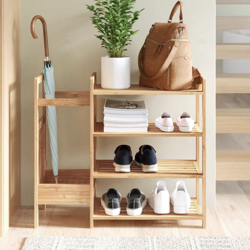 Stash umbrellas, shoes and bags in this storage nook &mdash; and find them easily when you're rushing out the door.<br /><br /><strong>Promising review:</strong> "This is the perfect place to put all my 'stuff' when I come home from work. Easy to assemble. Nice and sturdy!" &mdash; <a href="https://www.anrdoezrs.net/links/8209452/type/dlg/sid/-HPWayDaySale4-28-21-60896f93e4b09cce6c197126/https://www.wayfair.com/storage-organization/pdp/dotted-line-bamboo-entryway-8-pair-shoe-rack-w001991740.html" target="_blank" rel="noopener noreferrer">Theresa</a><br /><br /><strong>Price:</strong> <a href="https://www.anrdoezrs.net/links/8209452/type/dlg/sid/-HPWayDaySale4-28-21-60896f93e4b09cce6c197126/https://www.wayfair.com/storage-organization/pdp/dotted-line-bamboo-entryway-8-pair-shoe-rack-w001991740.html" target="_blank" rel="nofollow noopener noreferrer" data-skimlinks-tracking="5938996" data-vars-affiliate="CJ" data-vars-campaign="31WaydaySale-Hernandez-04-28-21-5938996/https://www.wayfair.com/storage-organization/pdp/dotted-line-bamboo-entryway-8-pair-shoe-rack-w001991740.html" data-vars-href="https://www.anrdoezrs.net/links/8209452/type/dlg/sid/31WaydaySale-Hernandez-04-28-21-5938996/https://www.wayfair.com/storage-organization/pdp/dotted-line-bamboo-entryway-8-pair-shoe-rack-w001991740.html" data-vars-keywords="cleaning" data-vars-link-id="16676603" data-vars-price="" data-vars-product-id="21102472" data-vars-product-img="https://secure.img1-fg.wfcdn.com/im/88323420/resize-h800-w800%5Ecompr-r85/9714/97149061/Bamboo+Entryway+8+Pair+Shoe+Rack.jpg" data-vars-product-title="Bamboo Entryway 8 Pair Shoe Rack" data-vars-redirecturl="https://www.wayfair.com/storage-organization/pdp/dotted-line-bamboo-entryway-8-pair-shoe-rack-w001991740.html" data-vars-retailers="wayfair" data-ml-dynamic="true" data-ml-dynamic-type="sl" data-orig-url="https://www.anrdoezrs.net/links/8209452/type/dlg/sid/31WaydaySale-Hernandez-04-28-21-5938996/https://www.wayfair.com/storage-organization/pdp/dotted-line-bamboo-entryway-8-pair-shoe-rack-w001991740.html" data-ml-id="87">$50.99</a> (originally $96.99)<br /><br /><i>See more entryway furniture <a href="https://go.skimresources.com?id=38395X987171&amp;xs=1&amp;xcust=-HPWayDaySale4-28-21-60896f93e4b09cce6c197126&amp;url=https%3A%2F%2Fwww.wayfair.com%2Fdaily-sales%2Fway-day%253a-entryway-furniture%7Ee220830.html" target="_blank" rel="noopener noreferrer">from $60</a>.</i>