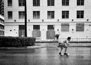 <p>A man skateboards down Ocean Drive Saturday in Miami Beach, Fla. (Photo: Holly Bailey/Yahoo News) </p>