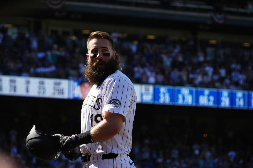 Colorado Rockies' Charlie Blackmon heads to the dugout after he was replaced by a pinch-runner following his single in his final at-bat in the third inning of a baseball game against the Los Angeles Dodgers, Sunday, Sept. 29, 2024, in Denver. (AP Photo/David Zalubowski)