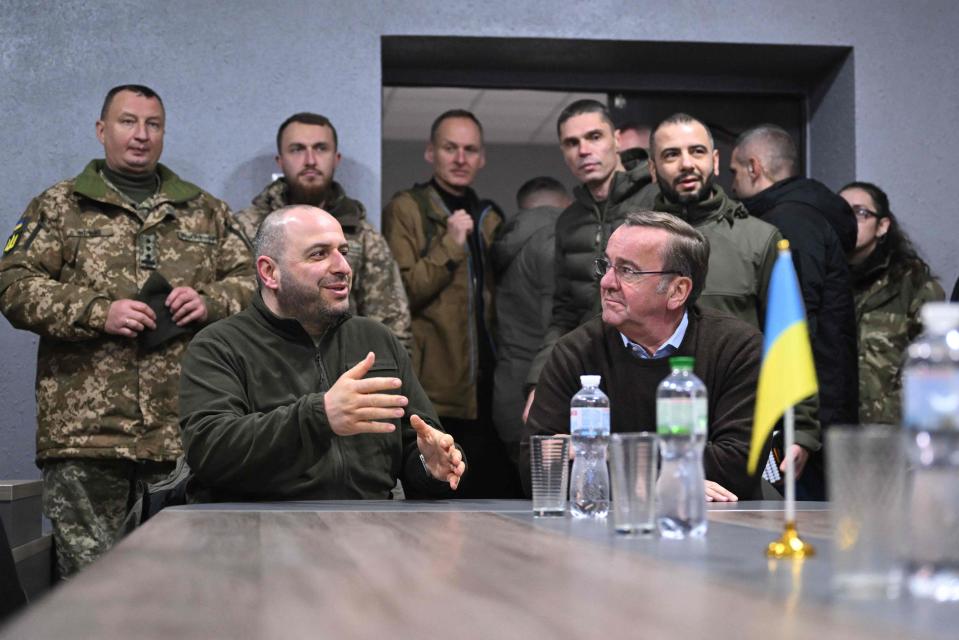 German defence minister Boris Pistorius (R) sits down his Ukrainian counterpart Rustem Umerov in Kyiv (AFP via Getty Images)