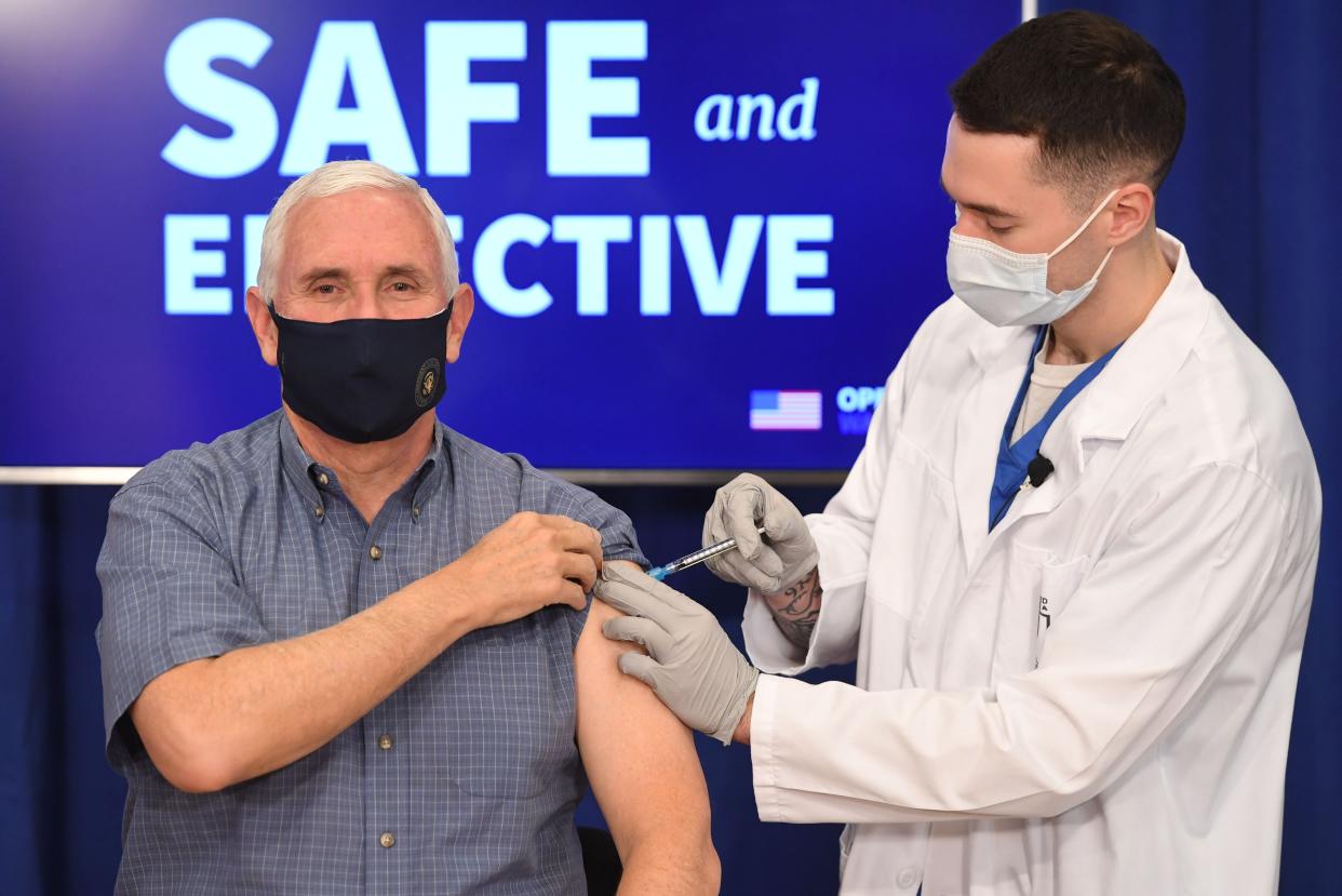 <p>File image: US vice president Mike Pence taking Covid-19 vaccine </p> (AFP via Getty Images)