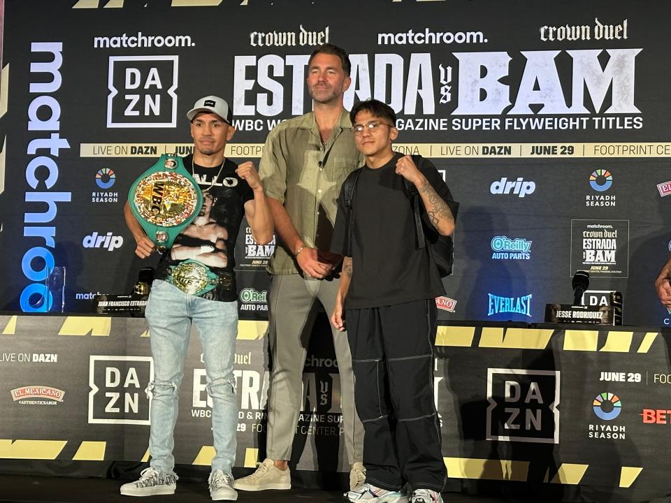 Juan Francisco Estrada and Jesse Rodriguez (right) flank Matchroom Boxing promoter Eddie Hearn at Thursday's pre-fight press conference in Phoenix. The two fight for two super flyweight titles Saturday at Footprint Center.