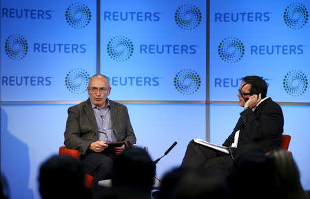 Former Russian tycoon Mikhail Khodorkovsky (L) speaks during a Reuters Newsmaker event at Canary Wharf in London, Britain, November 26, 2015. REUTERS/Peter Nicholls