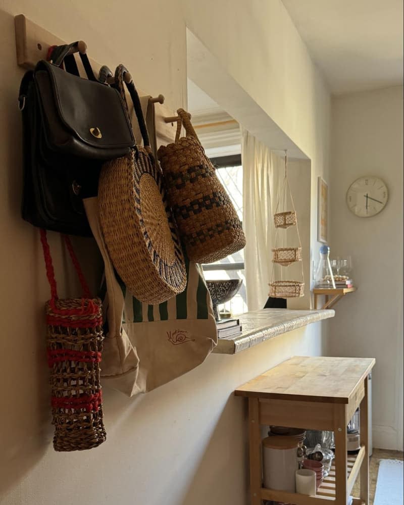 Purses hung on hook.