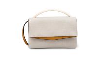 <p>Eddie Borgo has launched his first eco-friendly line of handbags made of undyed flax linen. This is one of four handbags in the collection. Flax requires 60 percent less water than cotton and can easily be grown chemical-free.<br><br>Boyd Vanity Linen Umber, $890, <a rel="nofollow noopener" href="http://www.eddieborgo.com/handbags/view-all/boyd-vanity-linen-umber" target="_blank" data-ylk="slk:eddieborgo.com" class="link ">eddieborgo.com</a> </p>