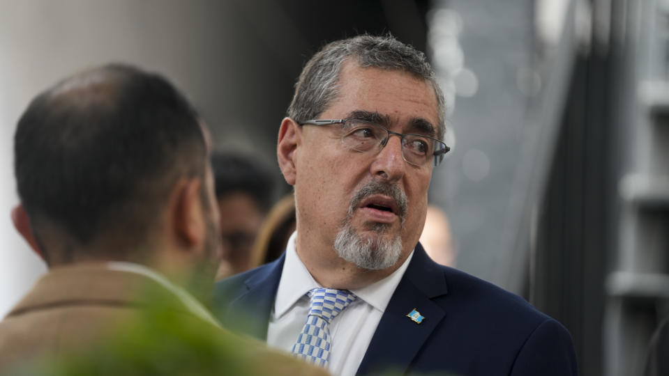 President-elect Bernardo Arévalo talks with his staff after giving a press conference in Guatemala City, Friday, Sept. 1, 2023. (AP Photo/Moises Castillo)