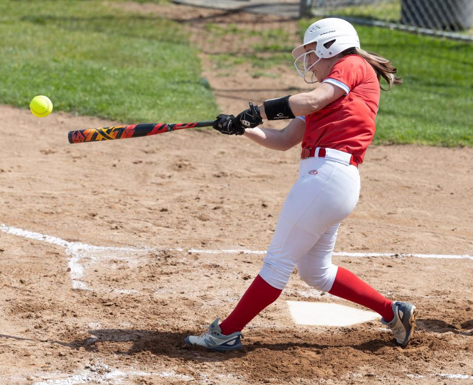 Alliance's Brianna Yoder takes a cut during their game at Massillon Saturday, May 6, 2023. 