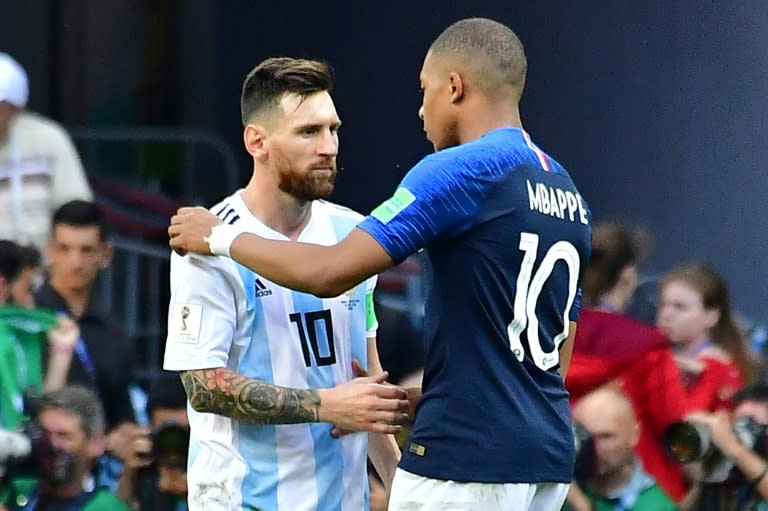Kylian Mbappe consoles Lionel Messi after France's 4-3 win over Argentina in the last 16 of the World Cup