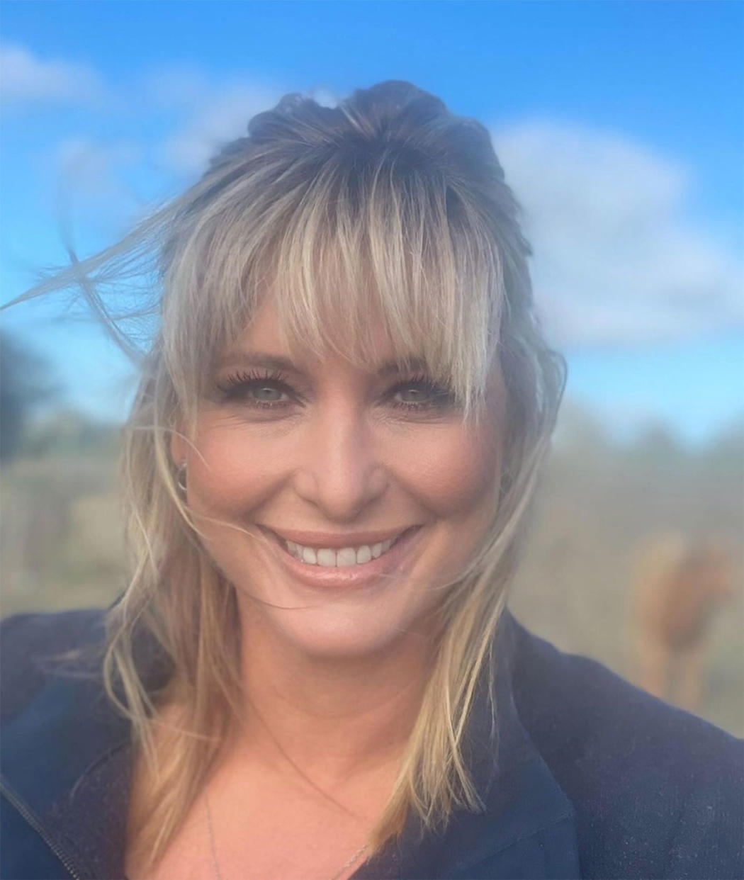 Johanna Griggs with a fringe and makeup