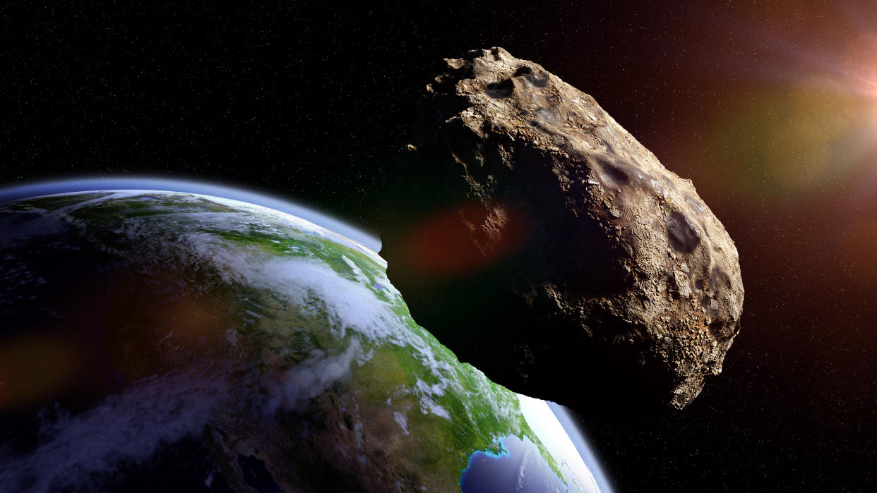 An illustration of an asteroid approaching Earth.