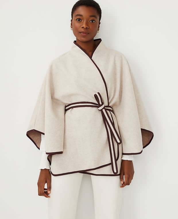 <p>Ann Taylor Tipped Belted Cape, $118, <a href="https://rstyle.me/+ac3MvcAMHjEem3hnkG--yQ" rel="nofollow noopener" target="_blank" data-ylk="slk:available here;elm:context_link;itc:0;sec:content-canvas" class="link ">available here</a> (one size).</p>