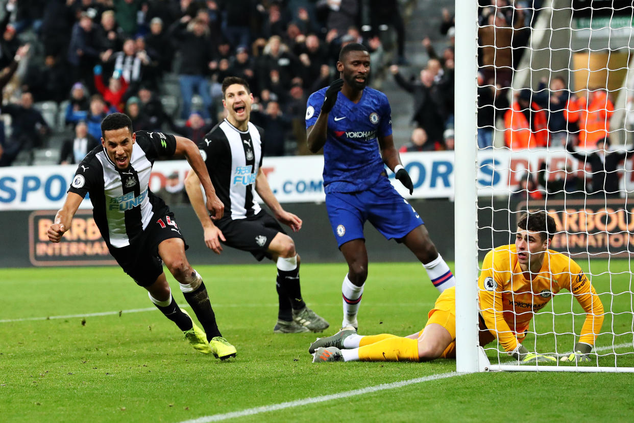 Newcastle's Isaac Hayden (left) celebrates after his goal beat keeper Kepa Arrizabalaga and Chelsea. (Photo by Alex Livesey/Getty Images)