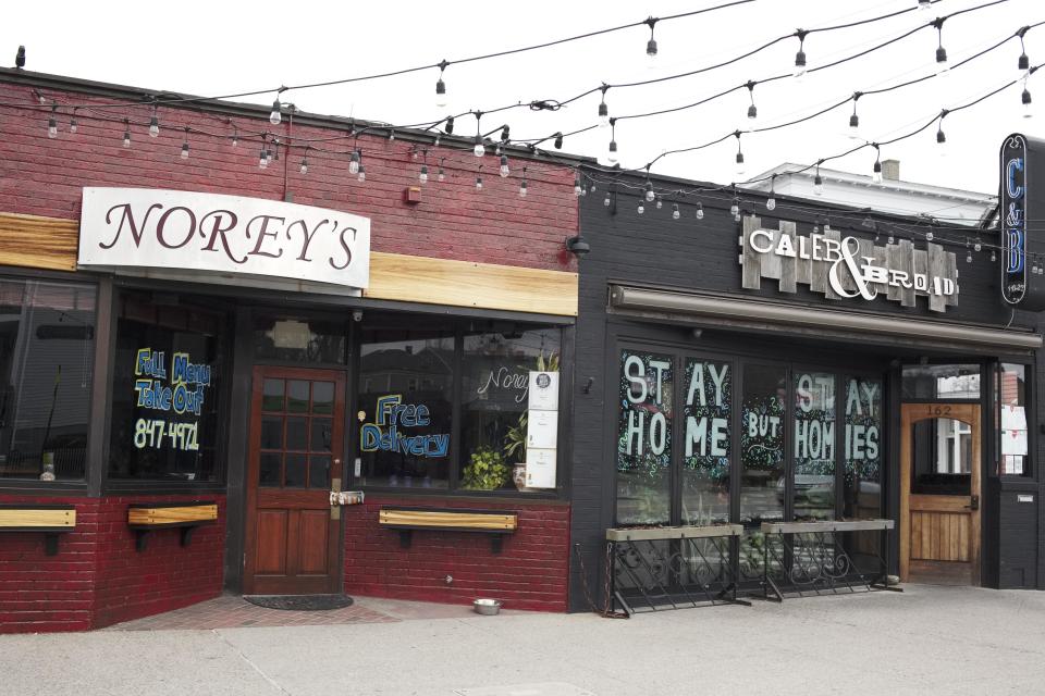 Dark windows at Norey's and Caleb & Broad in March 2020 shortly after the emergence of COVID-19 altered the restaurant landscape.