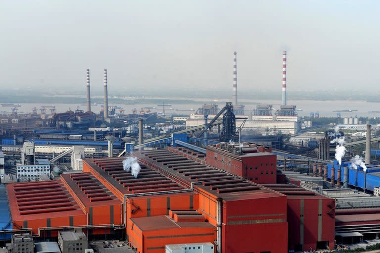 Photo illustration shows the Maanshan Iron and Steel Company in China's Anhui province. Economists say China faces mounting pressure to restructure its economy to ensure long-term growth, such as reducing its reliance on exports and boosting domestic consumption