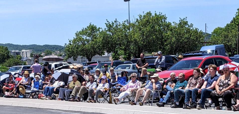 The audience sits in the parking lot outside Bud's Farmhouse in Manhattan Square in Oak Ridge for the Bud's on Broadway free concert Sunday, June 19, 2022.