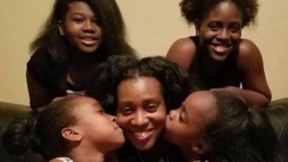 Sarah Jackson (middle) is pictured with her four daughters, she died trying to save her youngest daughter from drowning on Labor Day weekend.