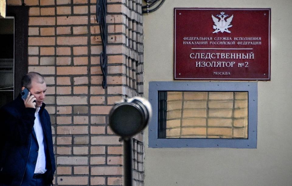 A man walks in front of the entrance to the Lefortovo prison