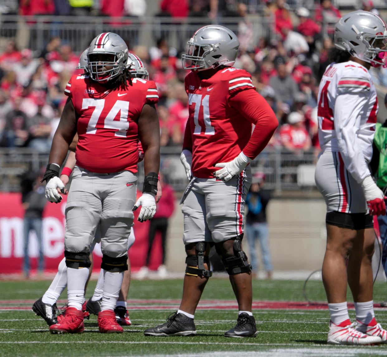 April 13, 2024; Columbus, Ohio, USA; 
Ohio State Buckeyes offensive lineman Donovan Jackson (74) and offensive tackle Josh Simmons (71) compete during the first half of the LifeSports spring football game at Ohio Stadium on Saturday.