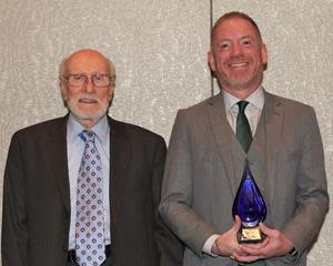 Jeffery R. Bray, MBA, MAED, SHRM-SCP, has been honored as the first recipient of PCCA's L. David Sparks Advocacy Award. PCCA Chief Executive Officer David Sparks, left, presented the award to Bray on Thursday, October 21, during PCCA’s 40th Anniversary International Seminar in Houston.