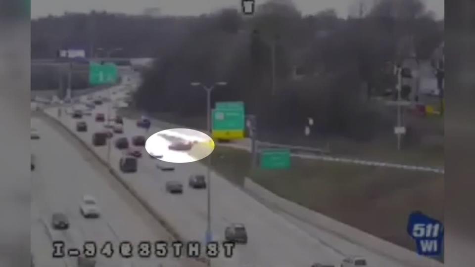 <div>WisDOT video red car fleeing police onto I-94 near 35th Street on March 30</div>