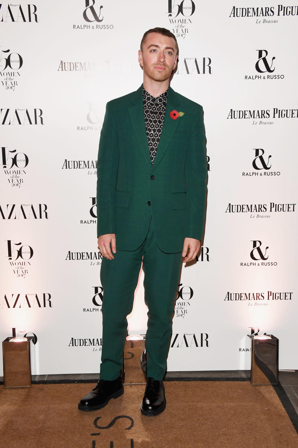 <p>Sam Smith stood out in the menswear category in a green suit.<br><i>[Photo: Getty]</i> </p>