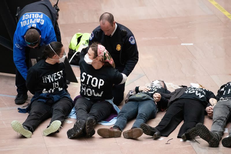Activists engage in civil disobedience in Hart Senate Office Building in Washington