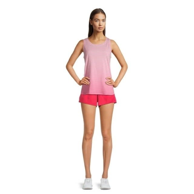 Model wearing pink running shorts