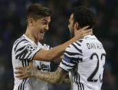 Soccer Football - FC Porto v Juventus - UEFA Champions League Round of 16 First Leg - Dragao Stadium, Porto, Portugal - 22/2/17 Juventus' Dani Alves celebrates scoring their second goal with Paulo Dybala Reuters / Miguel Vidal Livepic