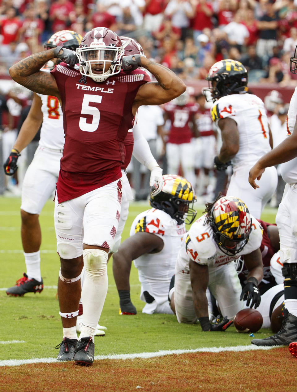 Temple linebacker Shaun Bradley (5) reacts to the defensive goal line stop of Maryland running back Anthony McFarland Jr. (5) during the second half of an NCAA college football, Saturday, Sept. 14, 2019, in Philadelphia. Temple won 20-17. (AP Photo/Chris Szagola)